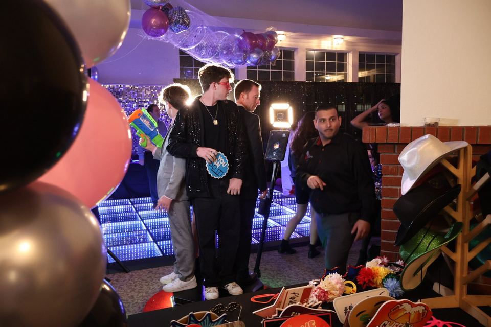 Guests posing on the LED infinity floor
